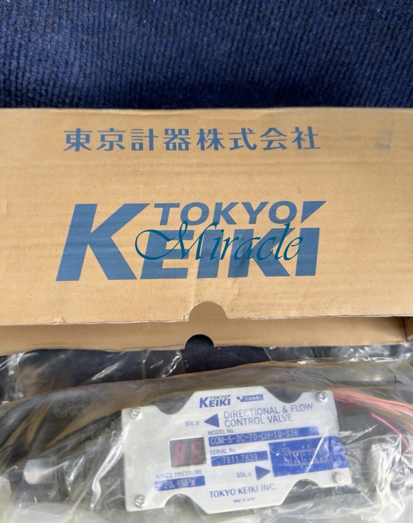 1PC New COM-5-2C-70-CH-10-S38 solenoid valve Use DHL for shipping