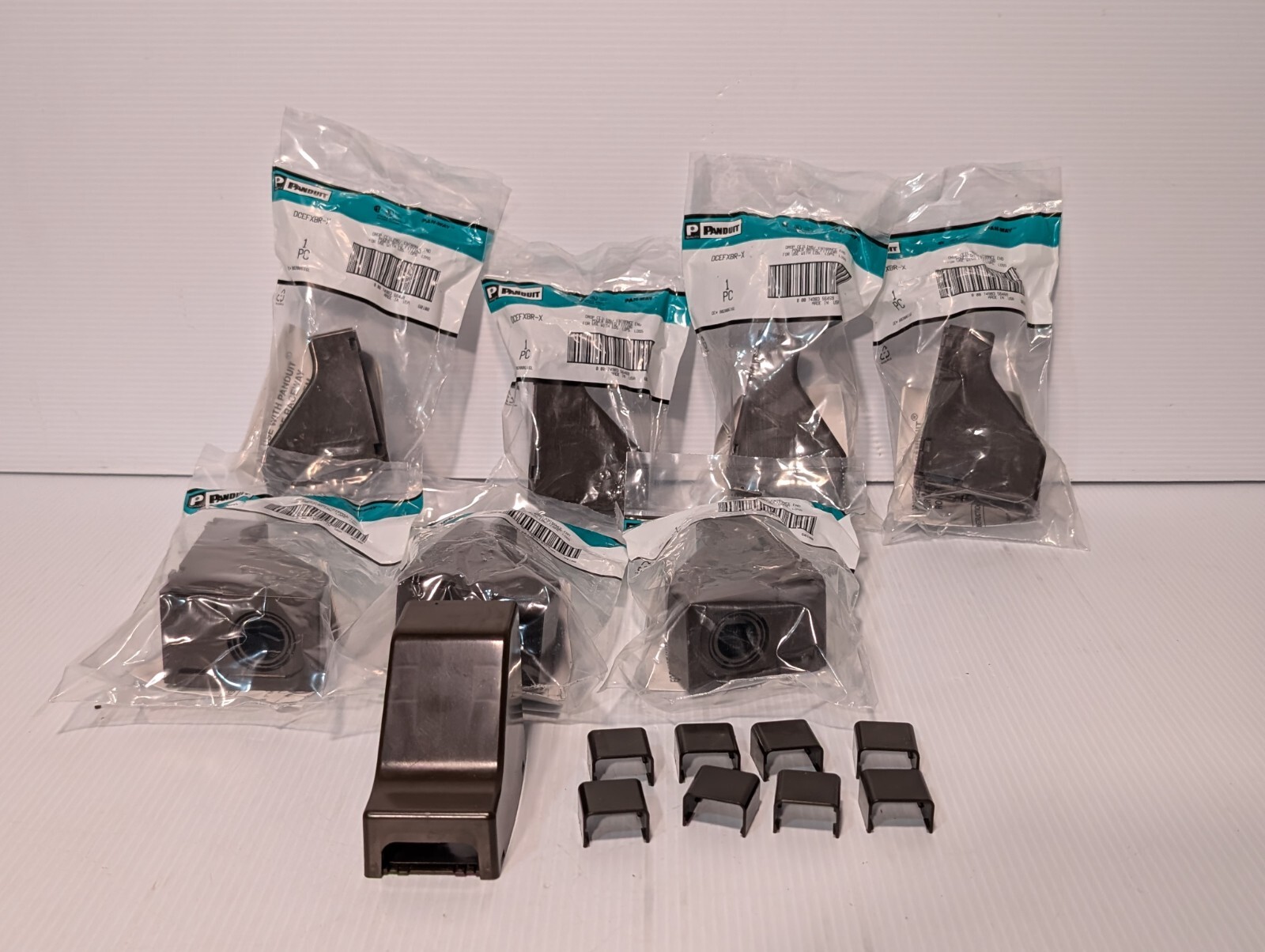Lot of Panduit items: boxes, connectors, hangers, etc. as pictured plus more