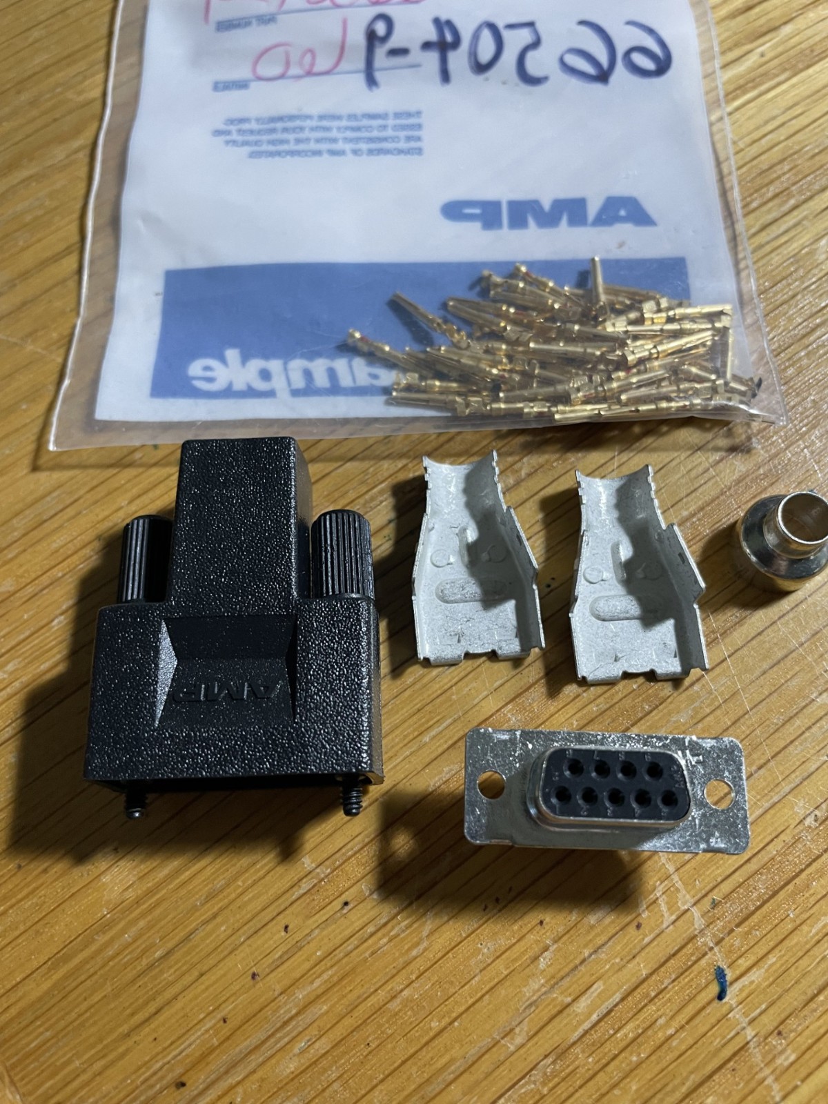 ONE AMP DB-9 HOUSING RCPT; p/n 747951-1 with 66504-9 pins