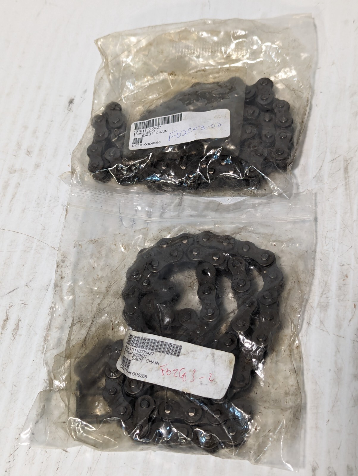 Lot of 2 Unbranded 150K838H01 Roller Chains as pictured