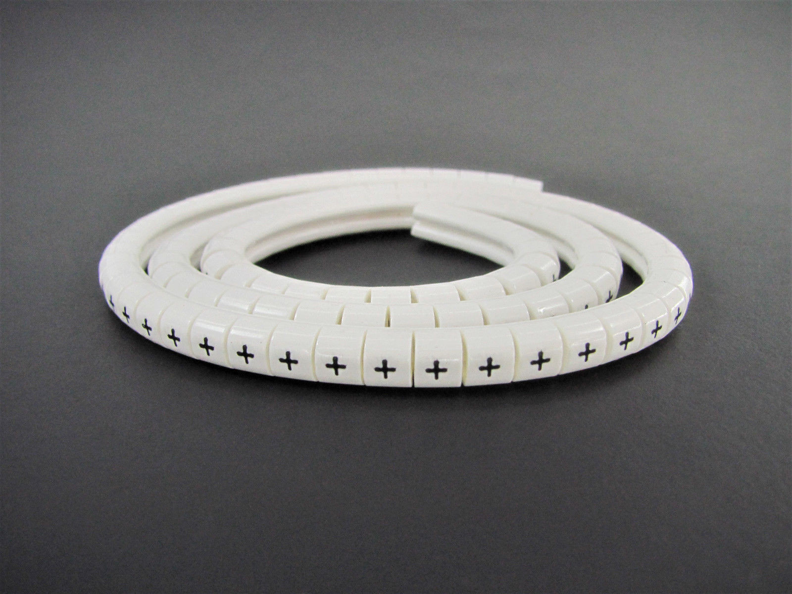 (100x) Wieland Size 4 Symbol +, Slip On Wire Marker, .110″ to .170″ OD Z Type
