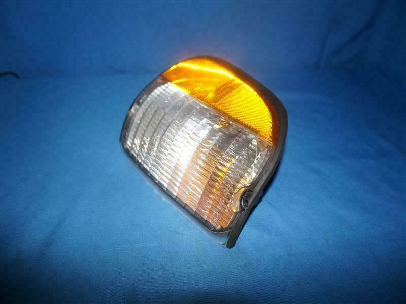 Ford F2UZ-13201-A F2UZ13201A Lamp Parking LH NEW NOB