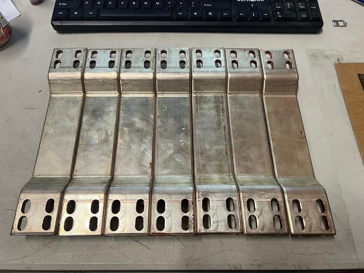 lot of 7 10″ busbar already bent and punched 4 oval holes each side see pictures