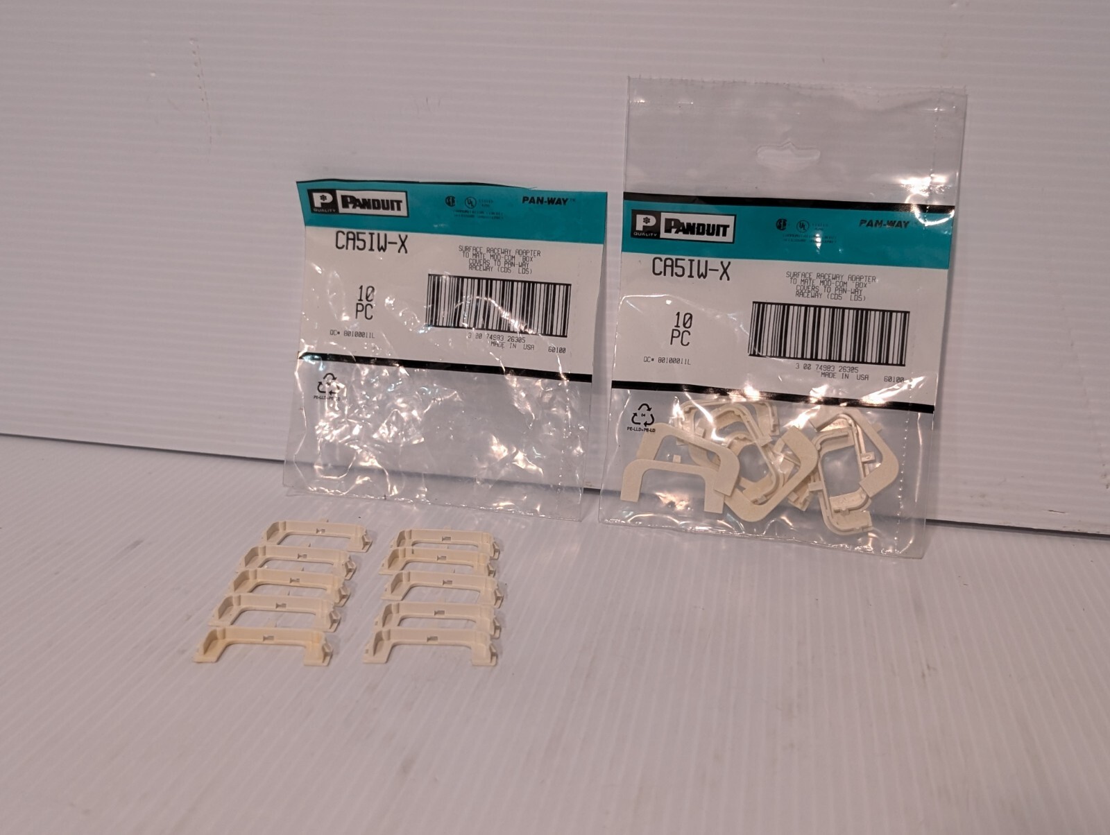 Lot of Panduit items: boxes, connectors, hangers, etc. as pictured plus more