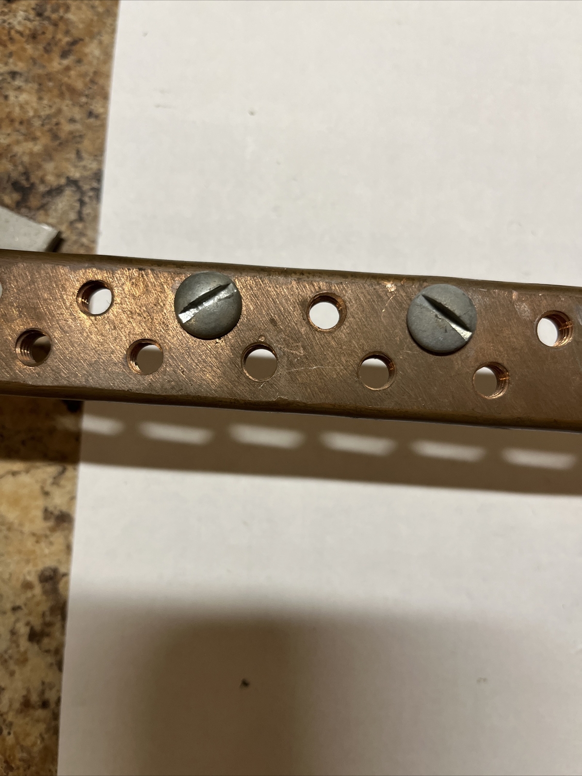 1/4” Copper ground bar 15” X 1” w isolation standoffs tapped for 1/4″ 31 Holes