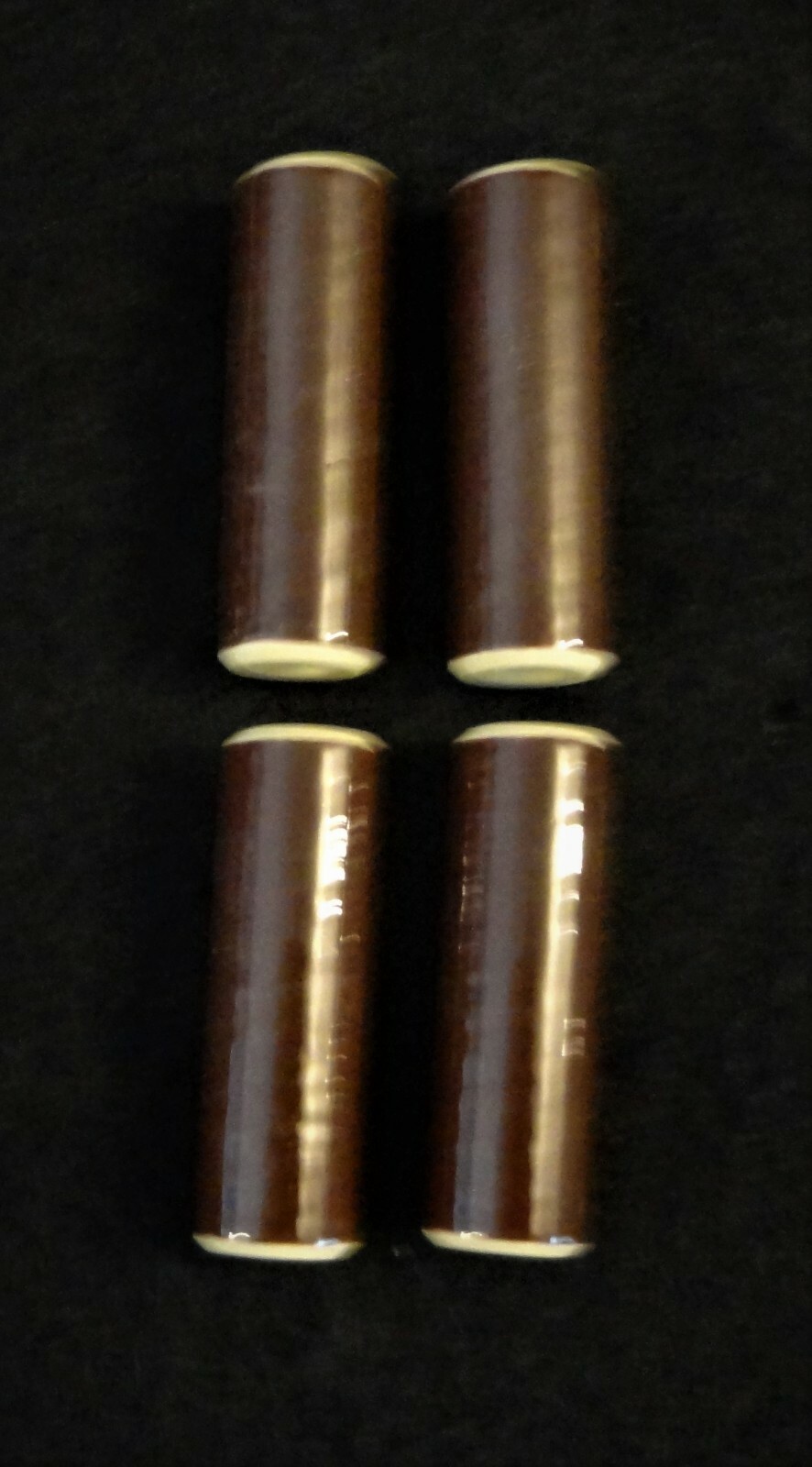 LOT OF FOUR VINTAGE BROWN GLAZED STEATITE INSULATORS w ID THREADED ENDS No.: 211